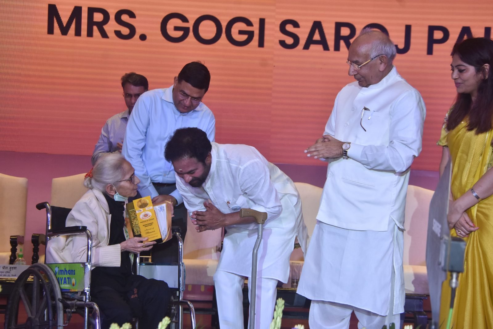 The Union Minister of Culture greeting Gogi Saroj Pal after the presentation