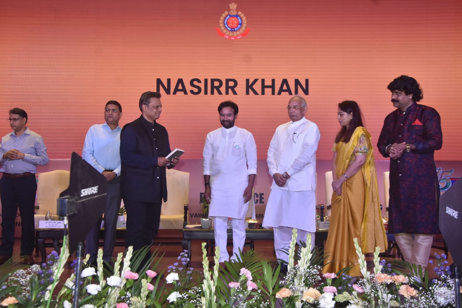 Nasirr Khan with the guests of honour on stage at Chitranjali