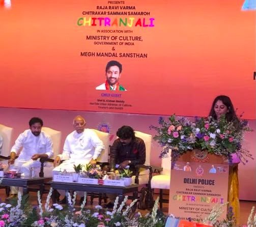 The Secretary at the podium during Chitranjali 2022