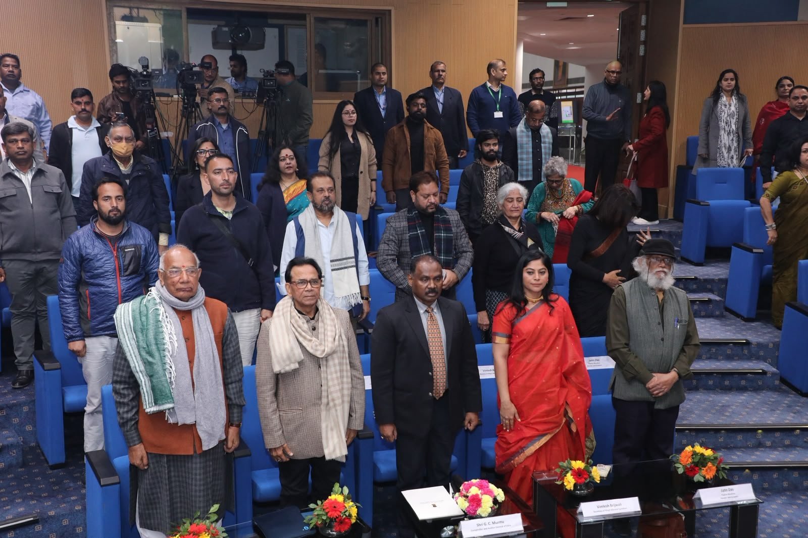 The audience standing for the national anthem at Chitranjali 2023