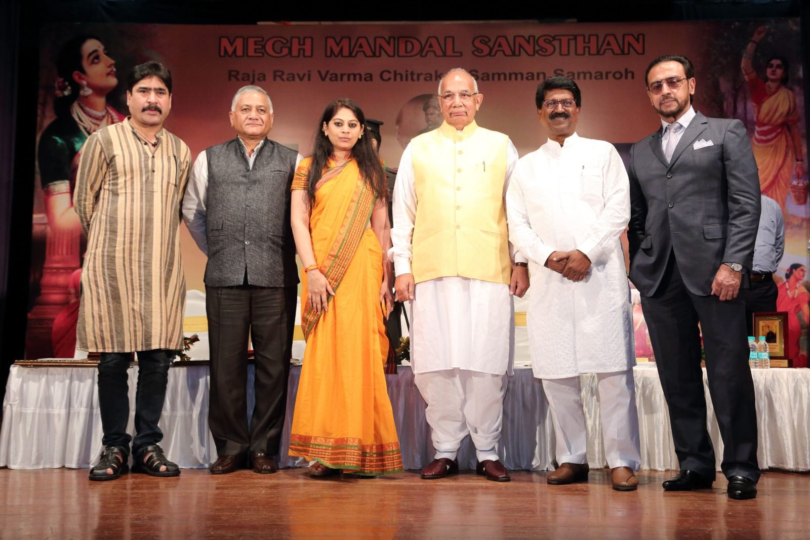 Guests of honour with Secretary Vimlesh Brijwall at the Raja Ravi Varma Chitrakar Samman Samaroh