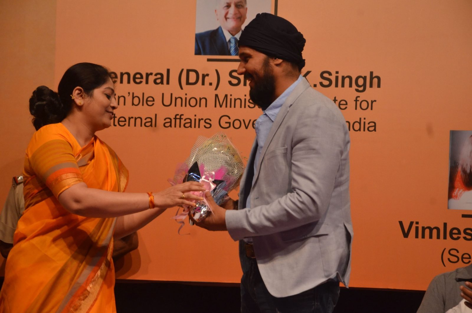 A guest of honour being welcomed with a bouquet at Chitranjali 2016