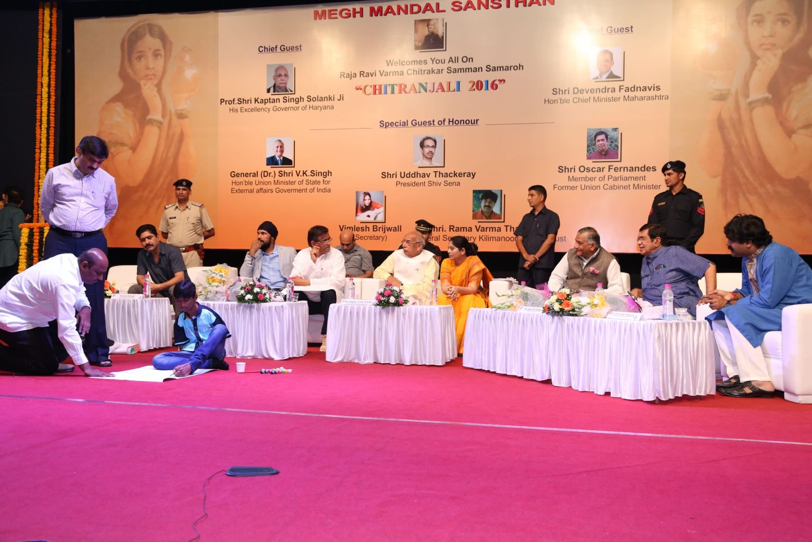 A bouquet being presented to a guest of honour at Chitranjali 2016