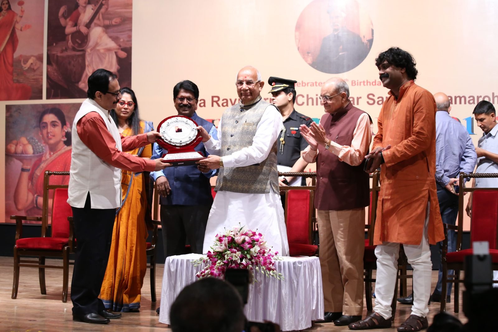 A silver commemorative plate being presented at Chitranjali 2017