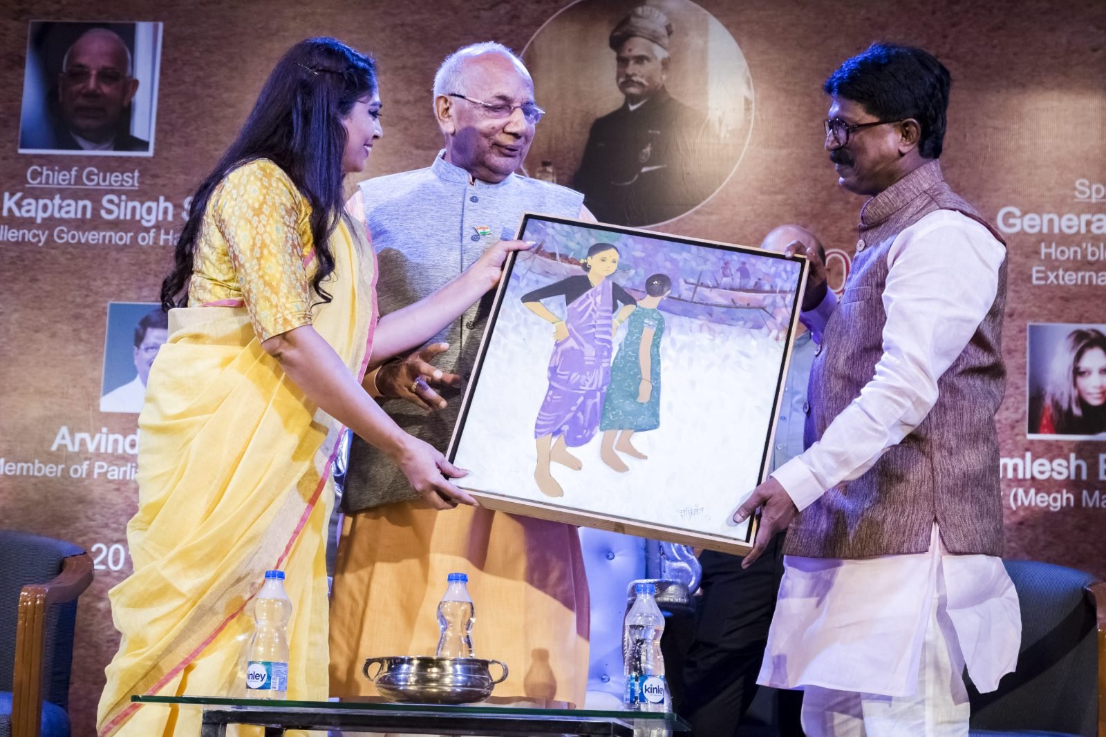 A painting presented to the Chief Guest on stage at Chitranjali 2018