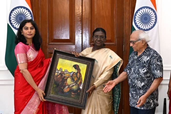 A painting presented to the President of India, with the artist present